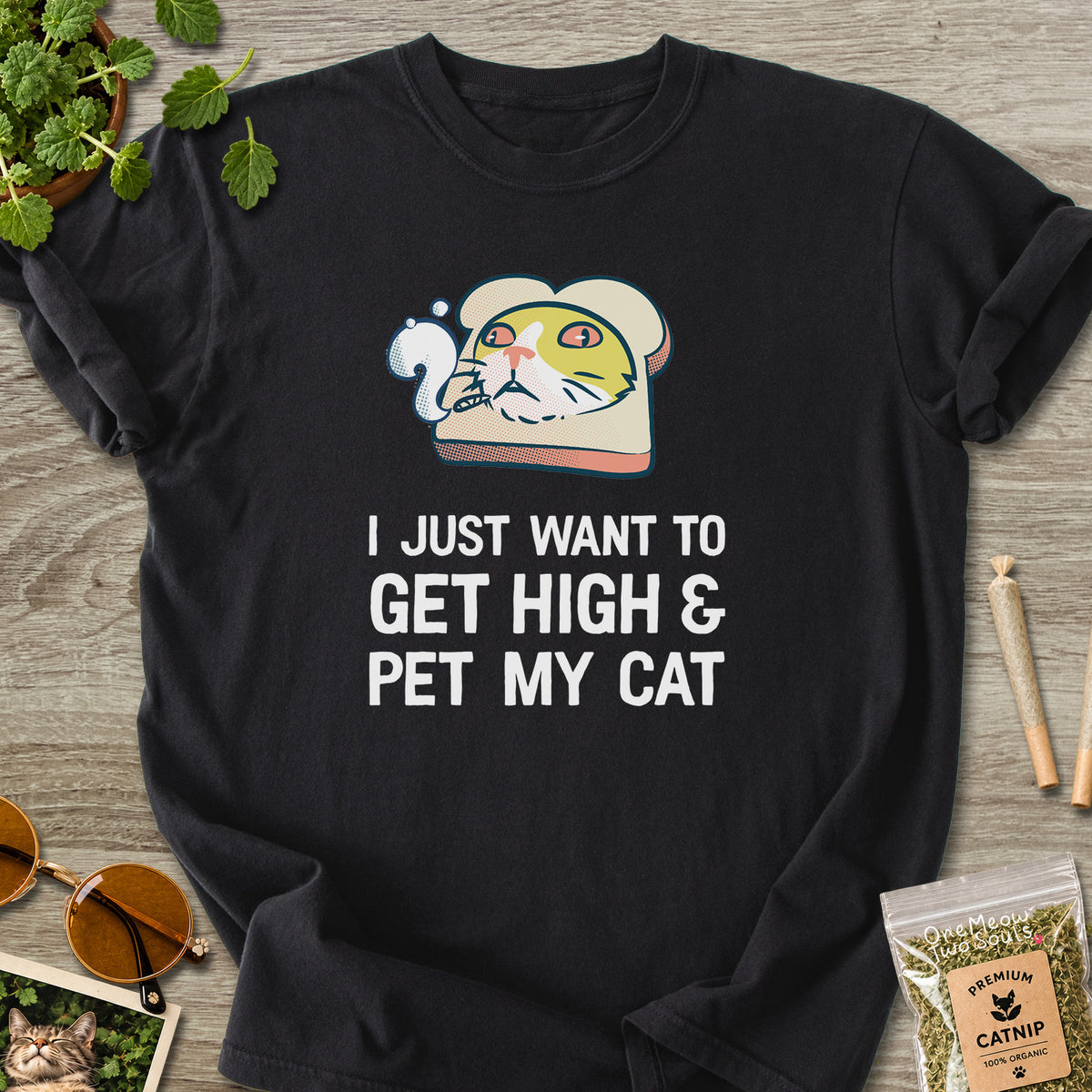 Black colored Comfort Colors 1717 cotton T-shirt, featuring a "I Just Want to Get High and pet My Cat" funny cat design illustration. One Meow Two Souls brand.