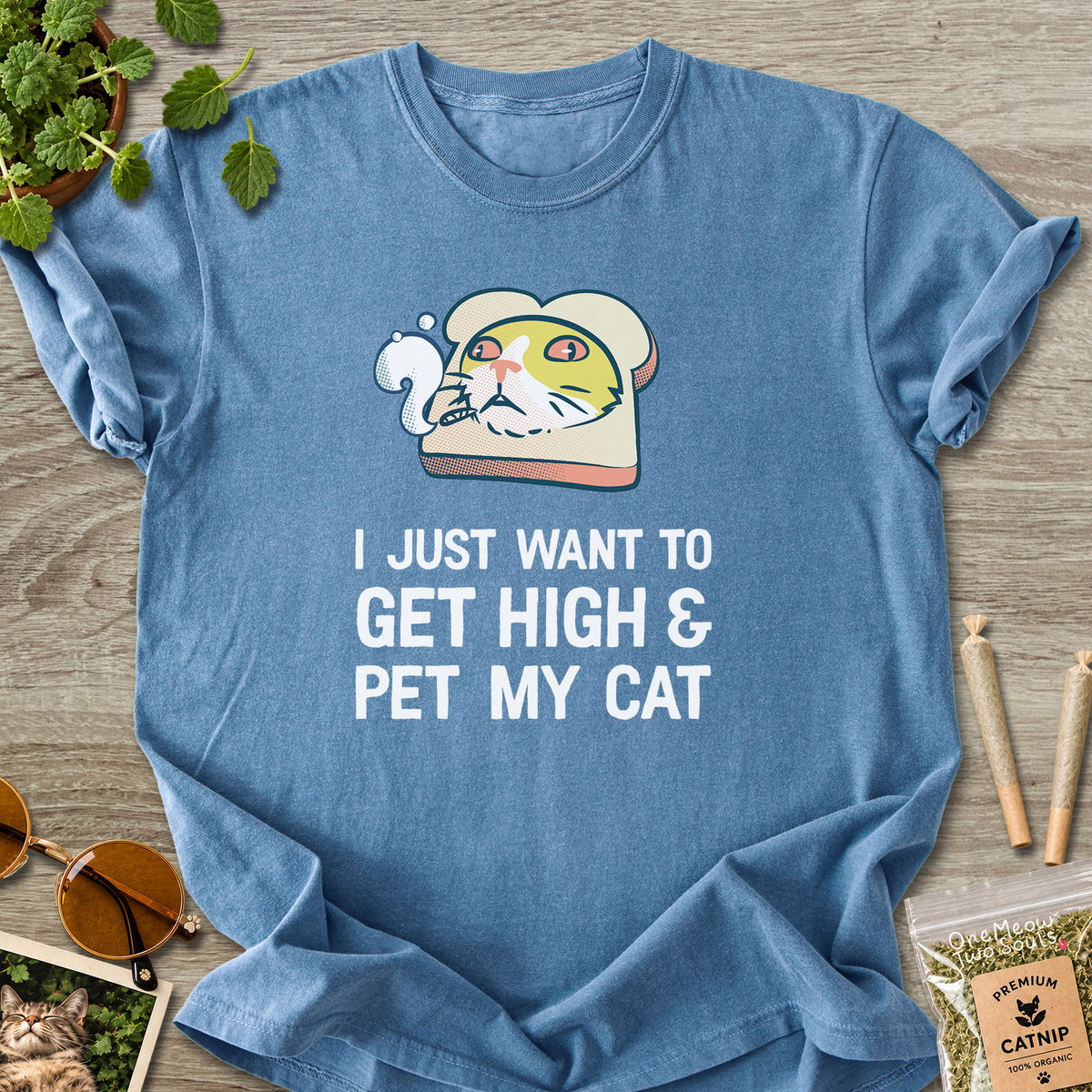 Blue Jean colored Comfort Colors 1717 cotton T-shirt, featuring a "I Just Want to Get High and pet My Cat" funny cat design illustration. One Meow Two Souls brand.