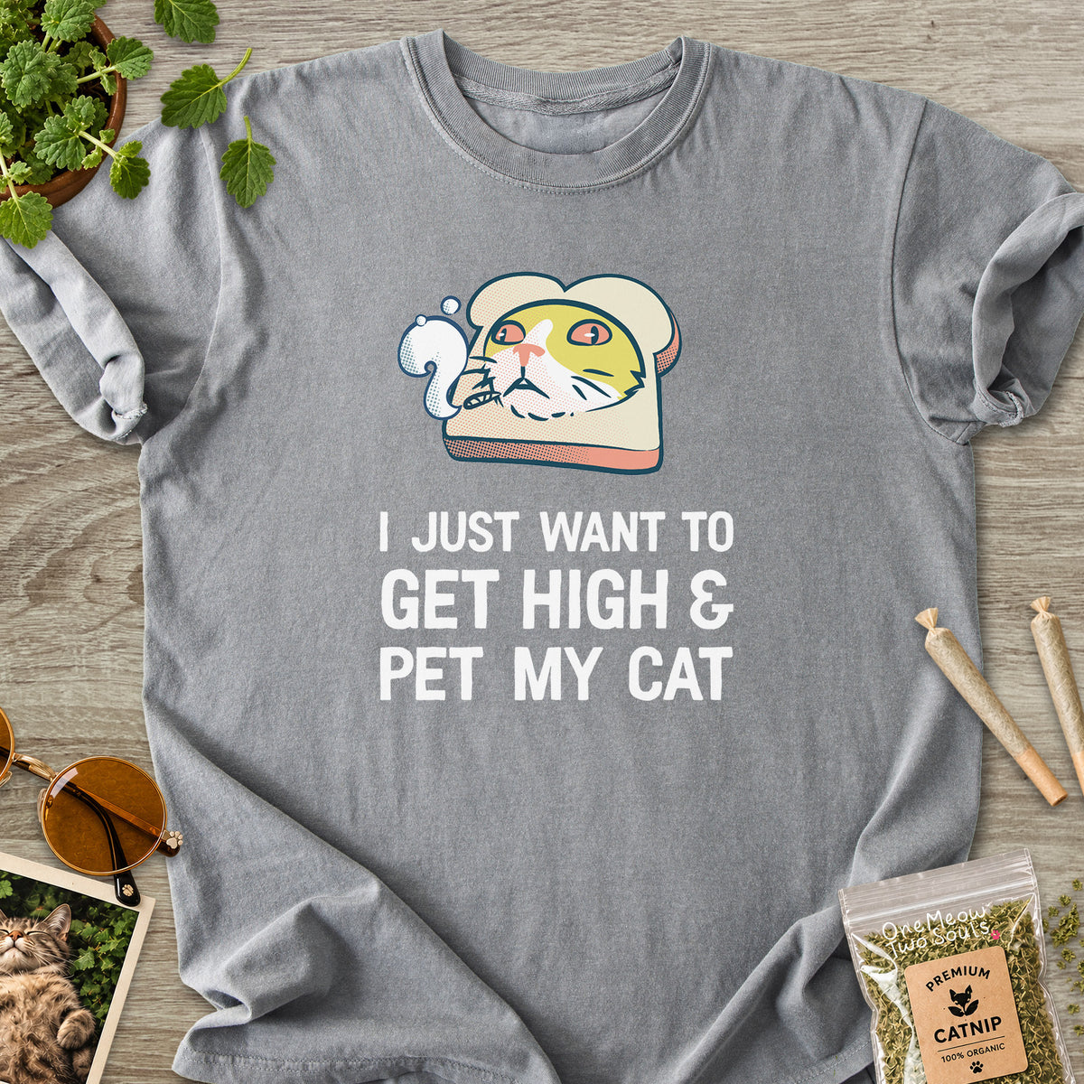 Grey colored Comfort Colors 1717 cotton T-shirt, featuring a "I Just Want to Get High and pet My Cat" funny cat design illustration. One Meow Two Souls brand.
