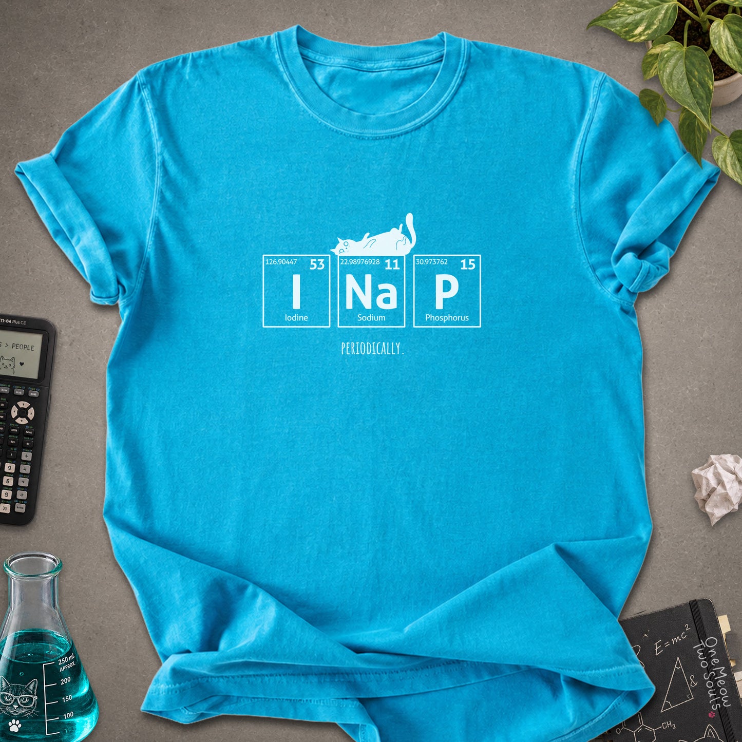 Sapphire colored Comfort Colors 1717 cotton T-shirt, presenting a "UI Nap, Periodically." funny cat chemistry design. One Meow Two Souls brand.