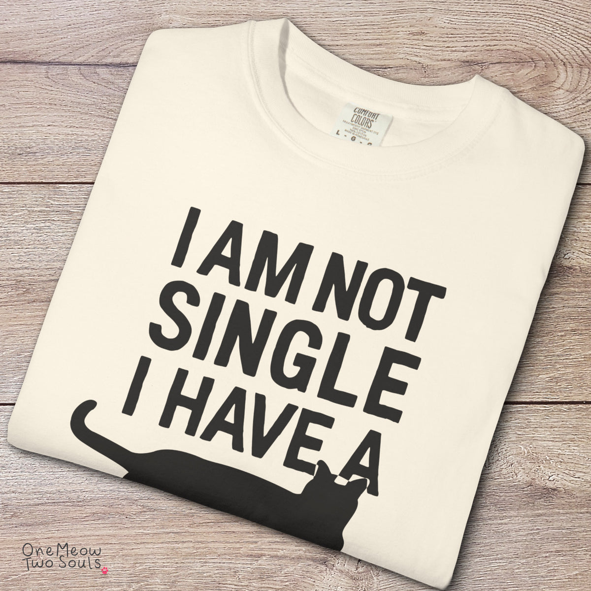 Ivory colored Comfort Colors 1717 cotton T-shirt, featuring a "I Am Not Single. I Have a Cat" funny cat design illustration. One Meow Two Souls brand.