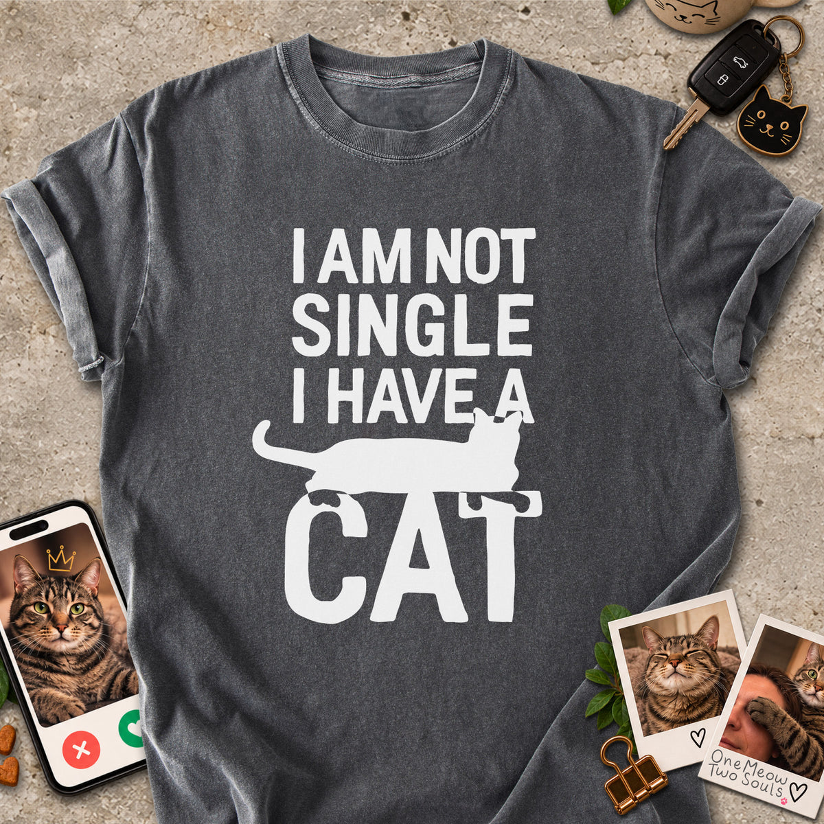 Pepper colored Comfort Colors 1717 cotton T-shirt, featuring a "I Am Not Single. I Have a Cat" funny cat design illustration. One Meow Two Souls brand.