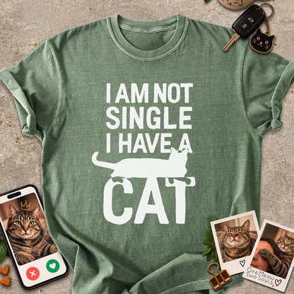 Moss  colored Comfort Colors 1717 cotton T-shirt, featuring a "I Am Not Single. I Have a Cat" funny cat design illustration. One Meow Two Souls brand.