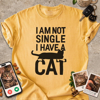 Mustard colored Comfort Colors 1717 cotton T-shirt, featuring a "I Am Not Single. I Have a Cat" funny cat design illustration. One Meow Two Souls brand.