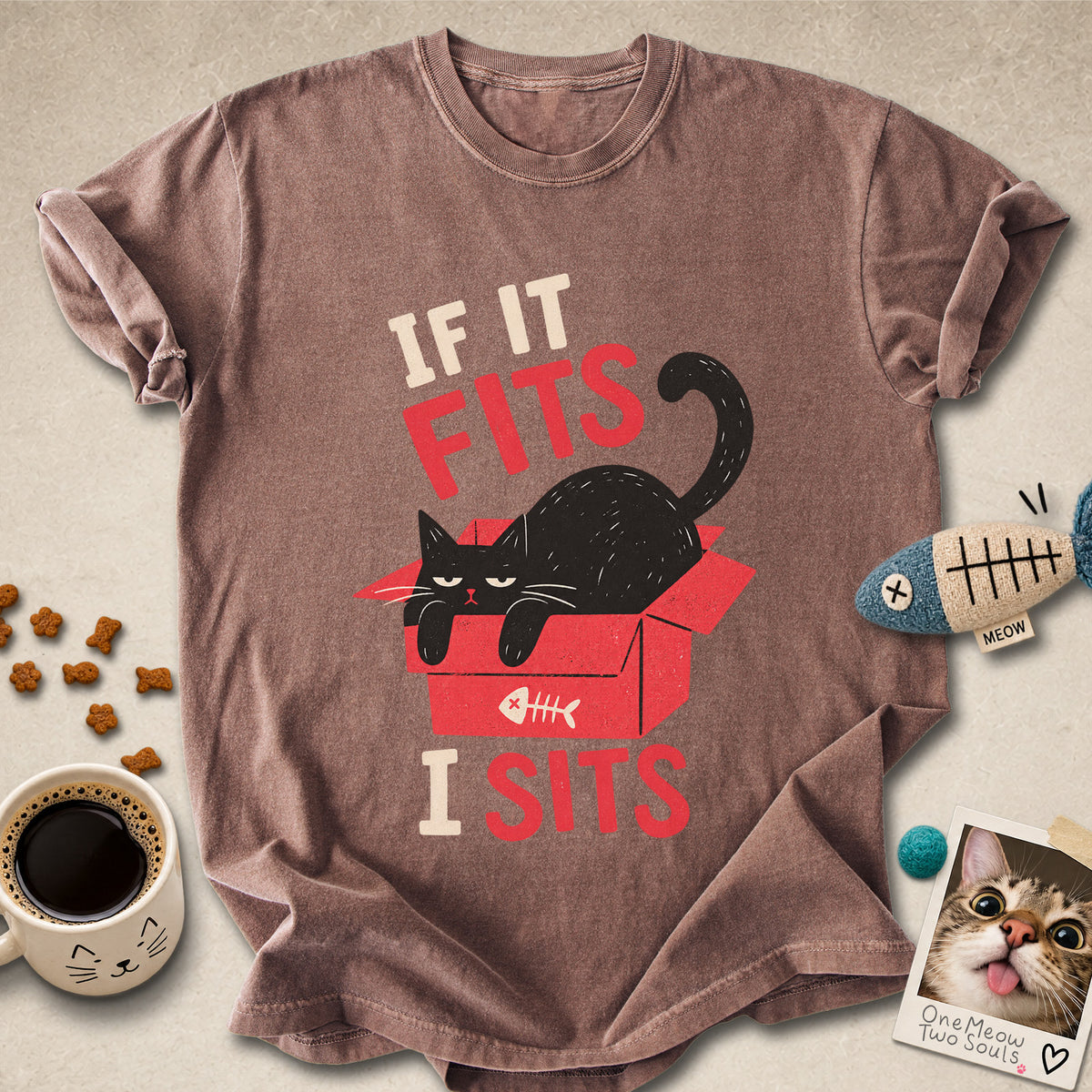 Espresso colored Comfort Colors 1717 cotton T-shirt, featuring a "If it fitsts I sits" funny cat design illustration. One Meow Two Souls brand.