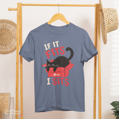 Blue jean colored Comfort Colors 1717 cotton T-shirt, featuring a "If it fitsts I sits" funny cat design illustration. One Meow Two Souls brand.
