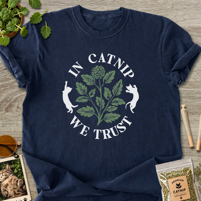 Navy colored Comfort Colors 1717 cotton T-shirt, featuring a "In Catnip We Trust" funny cat design illustration. One Meow Two Souls brand.