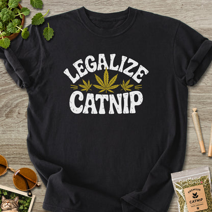 Black colored Comfort Colors 1717 cotton T-shirt, featuring a "Legalize Catnip" funny cat design illustration. One Meow Two Souls brand.