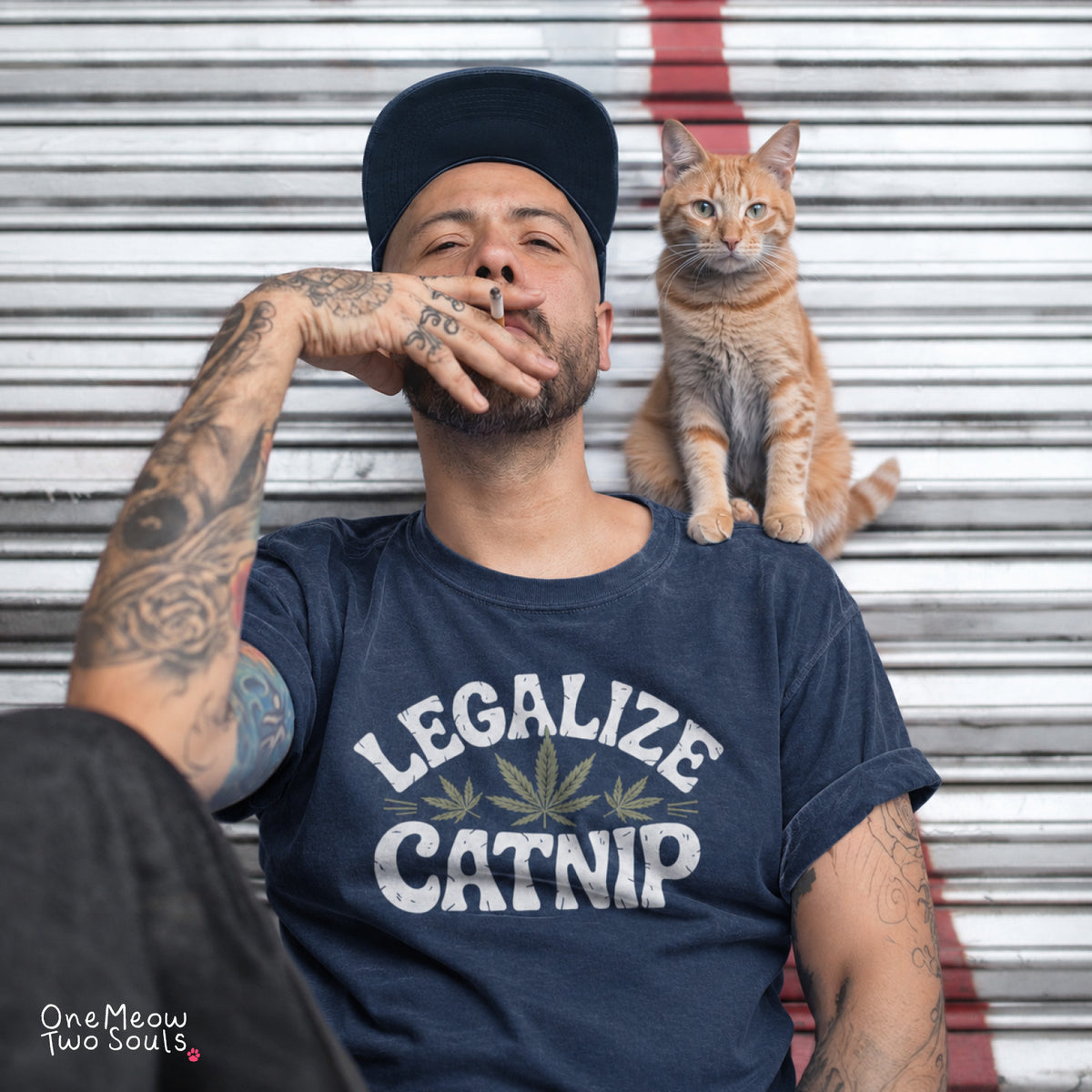 Navy colored Comfort Colors 1717 cotton T-shirt, featuring a "Legalize Catnip" funny cat design illustration. One Meow Two Souls brand.