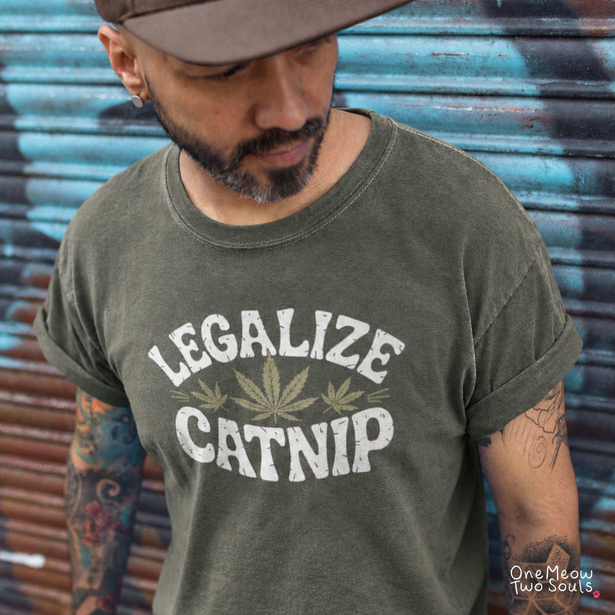 Moss colored Comfort Colors 1717 cotton T-shirt, featuring a "Legalize Catnip" funny cat design illustration. One Meow Two Souls brand.