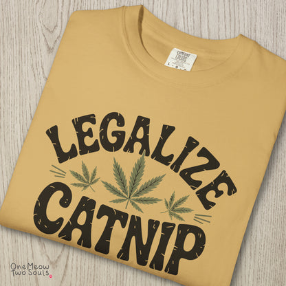 Mustard colored Comfort Colors 1717 cotton T-shirt, featuring a "Legalize Catnip" funny cat design illustration. One Meow Two Souls brand.