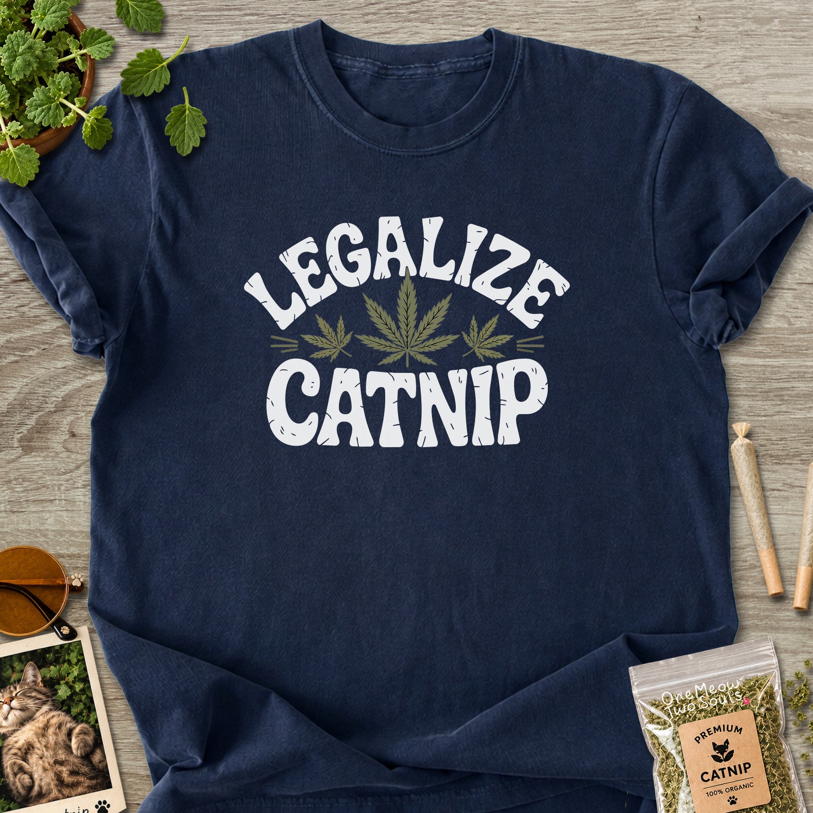 Navy colored Comfort Colors 1717 cotton T-shirt, featuring a "Legalize Catnip" funny cat design illustration. One Meow Two Souls brand.