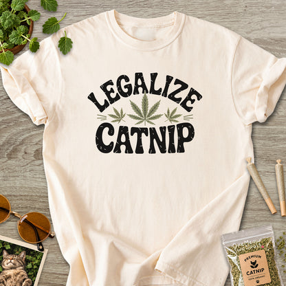 Ivory colored Comfort Colors 1717 cotton T-shirt, featuring a "Legalize Catnip" funny cat design illustration. One Meow Two Souls brand.