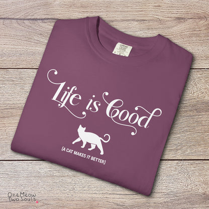 Berry colored Comfort Colors 1717 cotton T-shirt, featuring a "Life is good. A cat makes it better" funny cat design illustration. One Meow Two Souls brand.