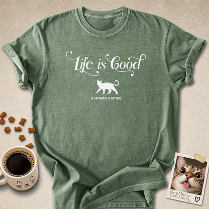Moss colored Comfort Colors 1717 cotton T-shirt, featuring a "Life is good. A cat makes it better" funny cat design illustration. One Meow Two Souls brand.