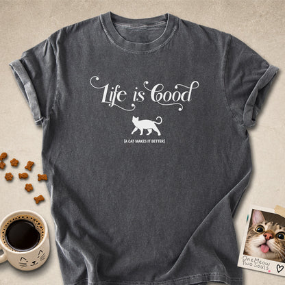 Pepper colored Comfort Colors 1717 cotton T-shirt, featuring a "Life is good. A cat makes it better" funny cat design illustration. One Meow Two Souls brand.