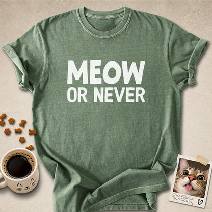 Moss colored Comfort Colors 1717 cotton T-shirt, featuring a "Meow Or Never" funny cat design illustration. One Meow Two Souls brand.