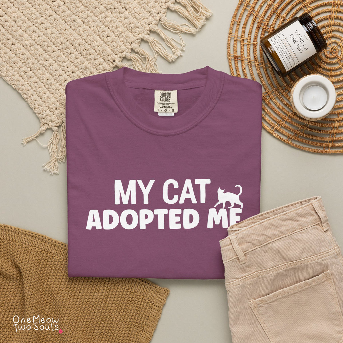 Berry colored Comfort Colors 1717 cotton T-shirt, featuring a "My Cat Adopted Me" funny cat design illustration. One Meow Two Souls brand.