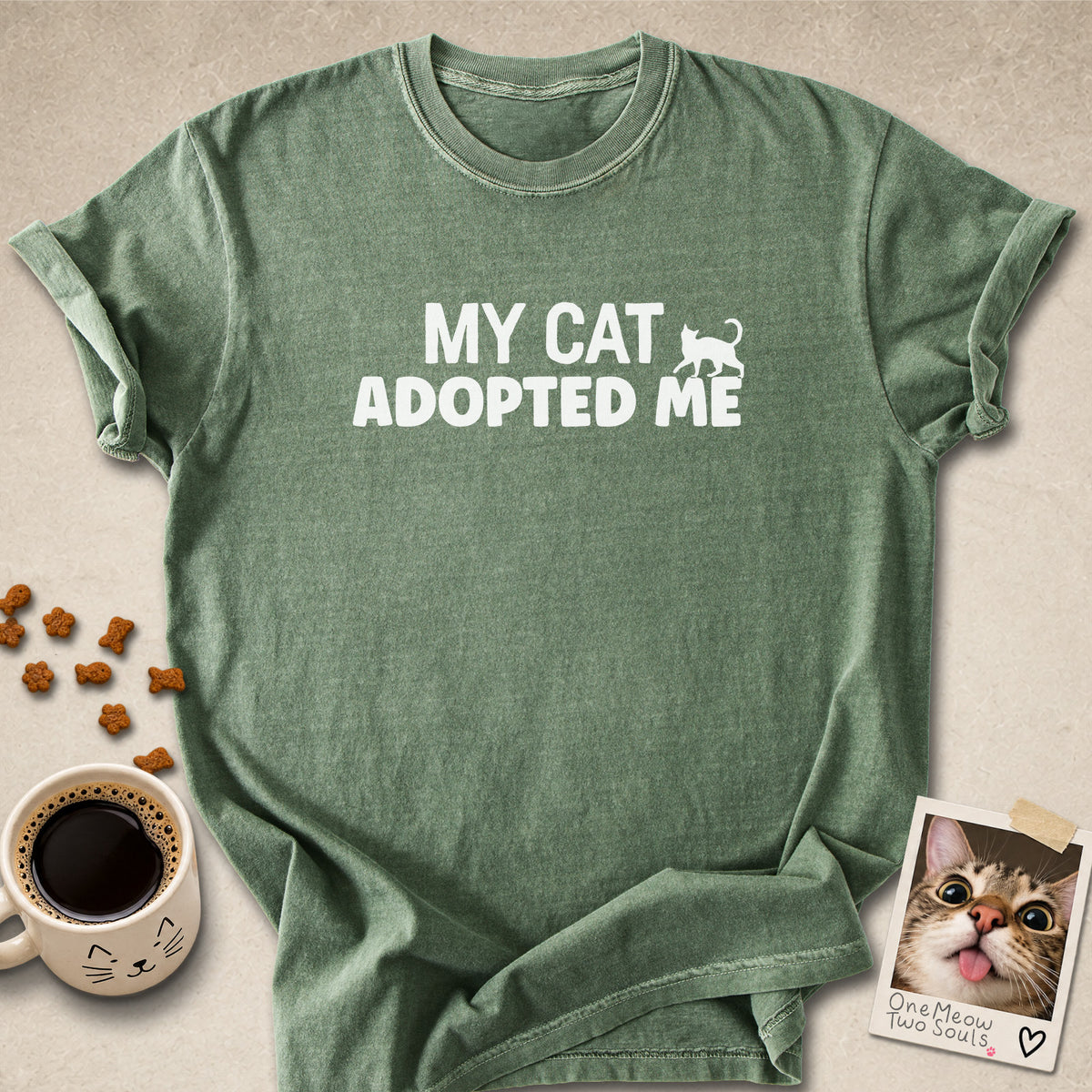Moss colored Comfort Colors 1717 cotton T-shirt, featuring a "My Cat Adopted Me" funny cat design illustration. One Meow Two Souls brand.