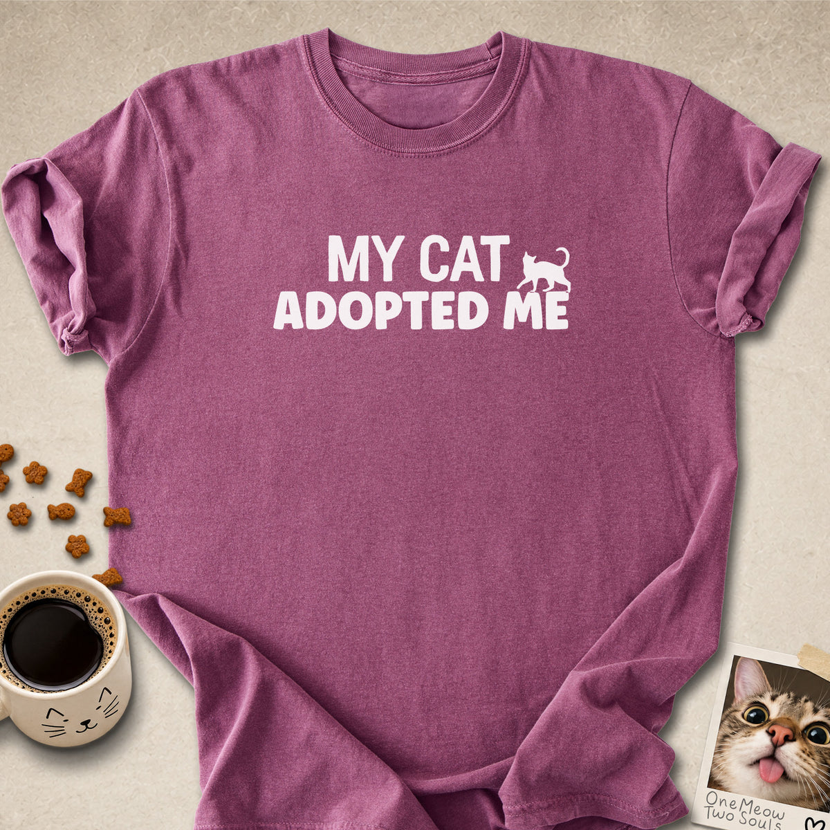Berry colored Comfort Colors 1717 cotton T-shirt, featuring a "My Cat Adopted Me" funny cat design illustration. One Meow Two Souls brand.