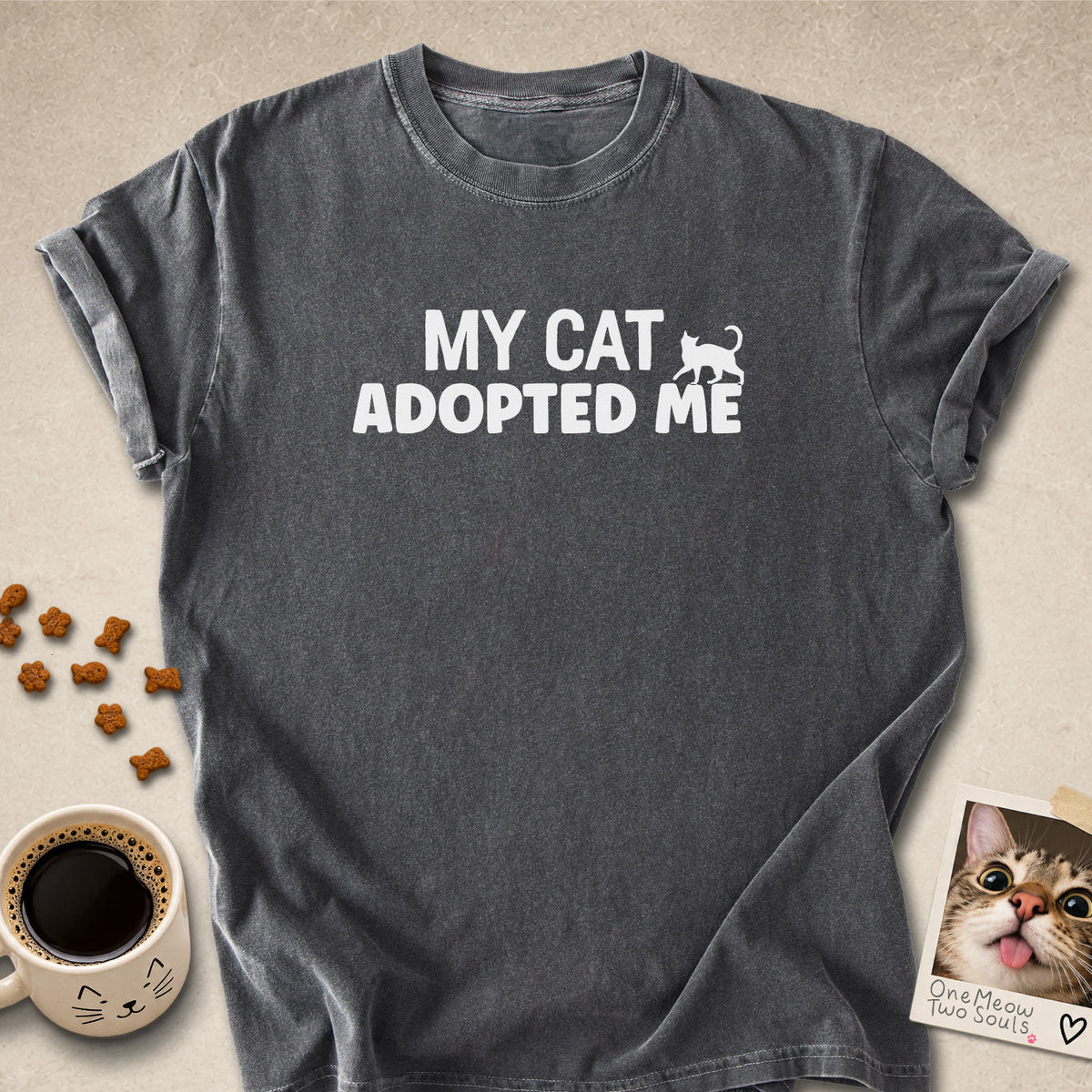 Pepper colored Comfort Colors 1717 cotton T-shirt, featuring a "My Cat Adopted Me" funny cat design illustration. One Meow Two Souls brand.