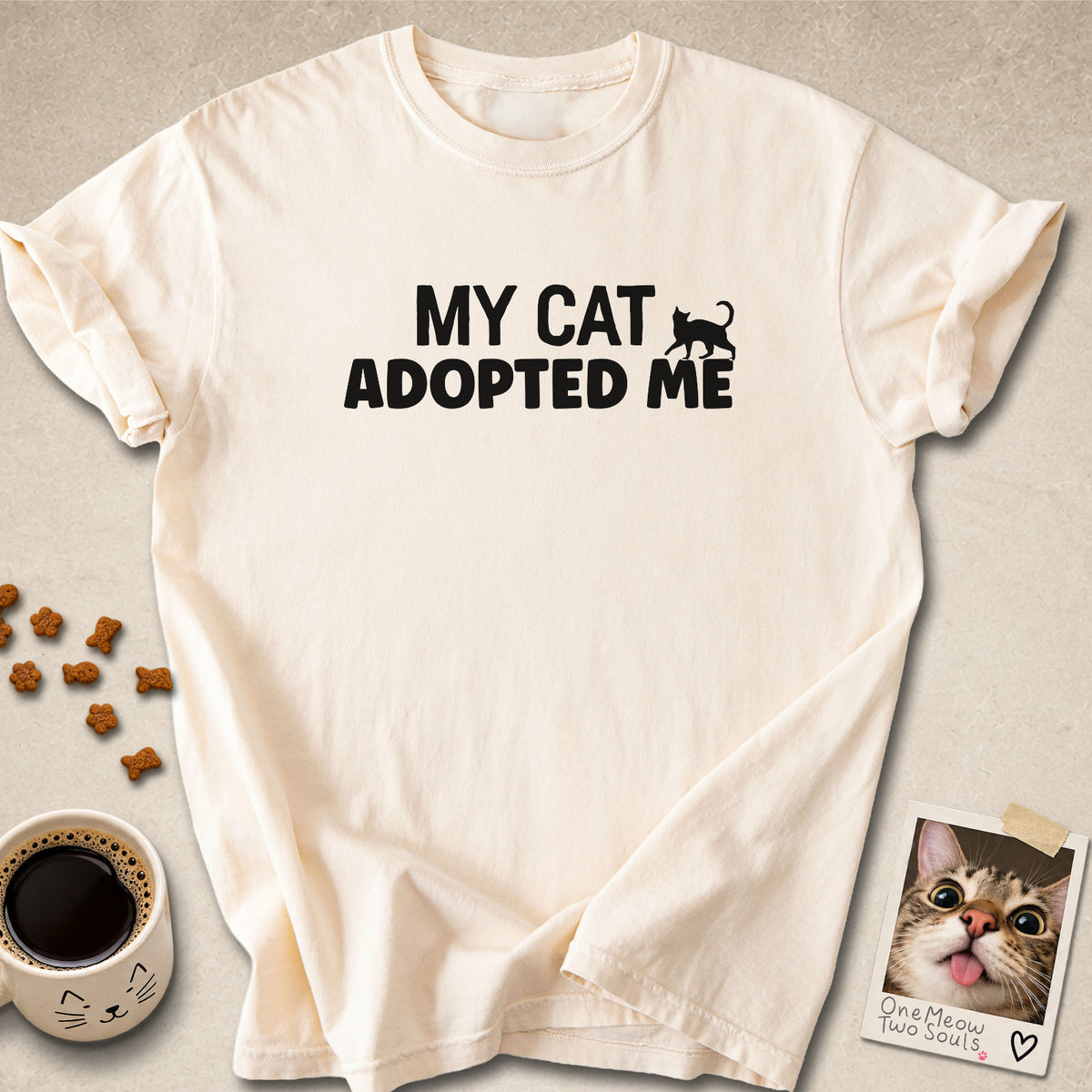 Ivory  colored Comfort Colors 1717 cotton T-shirt, featuring a "My Cat Adopted Me" funny cat design illustration. One Meow Two Souls brand.