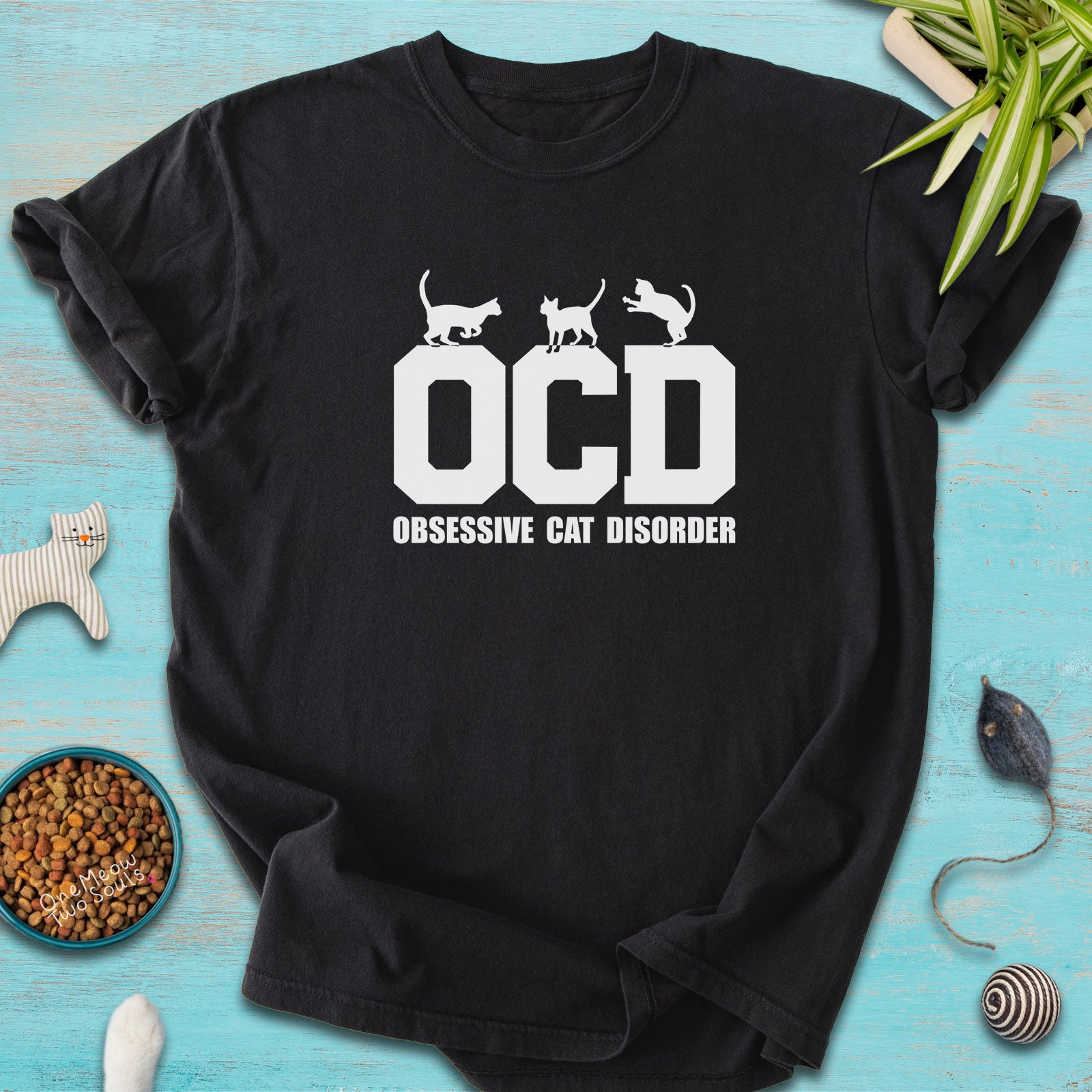 Black colored Comfort Colors 1717 t-shirt with a "OCD - Obsessive Cat Disorder" design. One Meow Two Souls brand.