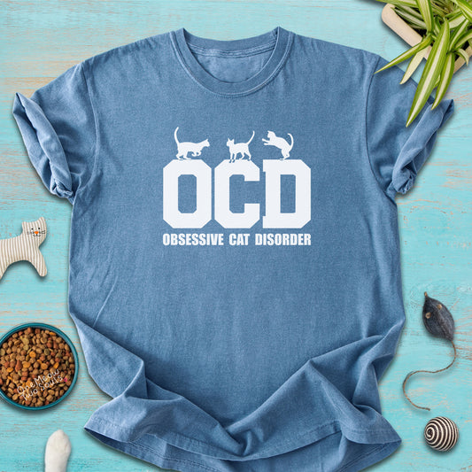 Blue Jean colored Comfort Colors 1717 t-shirt with a "OCD - Obsessive Cat Disorder" design. One Meow Two Souls brand.