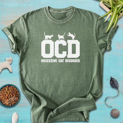 Moss colored Comfort Colors 1717 t-shirt with a "OCD - Obsessive Cat Disorder" design. One Meow Two Souls brand.