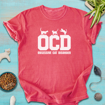 Watermelon colored Comfort Colors 1717 t-shirt with a "OCD - Obsessive Cat Disorder" design. One Meow Two Souls brand.