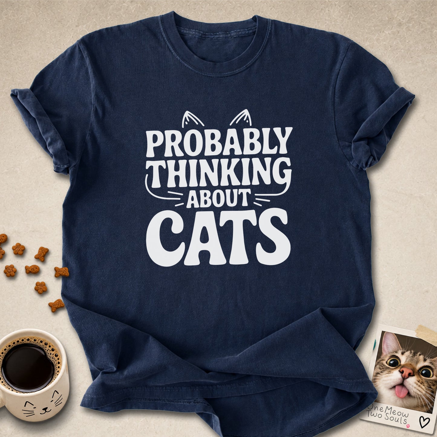 Navy colored Comfort Colors 1717 cotton T-shirt, featuring a "Probably thinking about cats" funny cat design illustration. One Meow Two Souls brand.