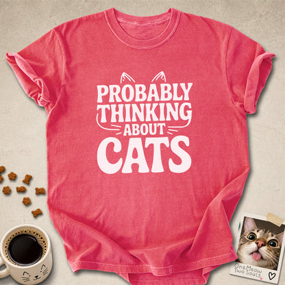 Watermelon  colored Comfort Colors 1717 cotton T-shirt, featuring a "Probably thinking about cats" funny cat design illustration. One Meow Two Souls brand.