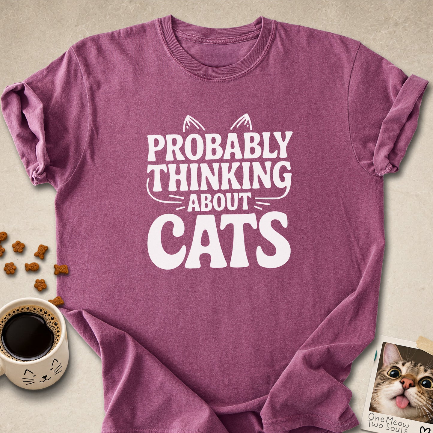 Berry colored Comfort Colors 1717 cotton T-shirt, featuring a "Probably thinking about cats" funny cat design illustration. One Meow Two Souls brand.