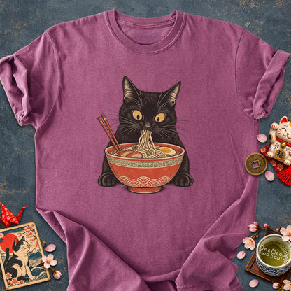 Berry colored Comfort Colors 1717 cotton T-shirt, featuring a Black cat eating Japanese ramen noodles. Funny cat design illustration. One Meow Two Souls brand.