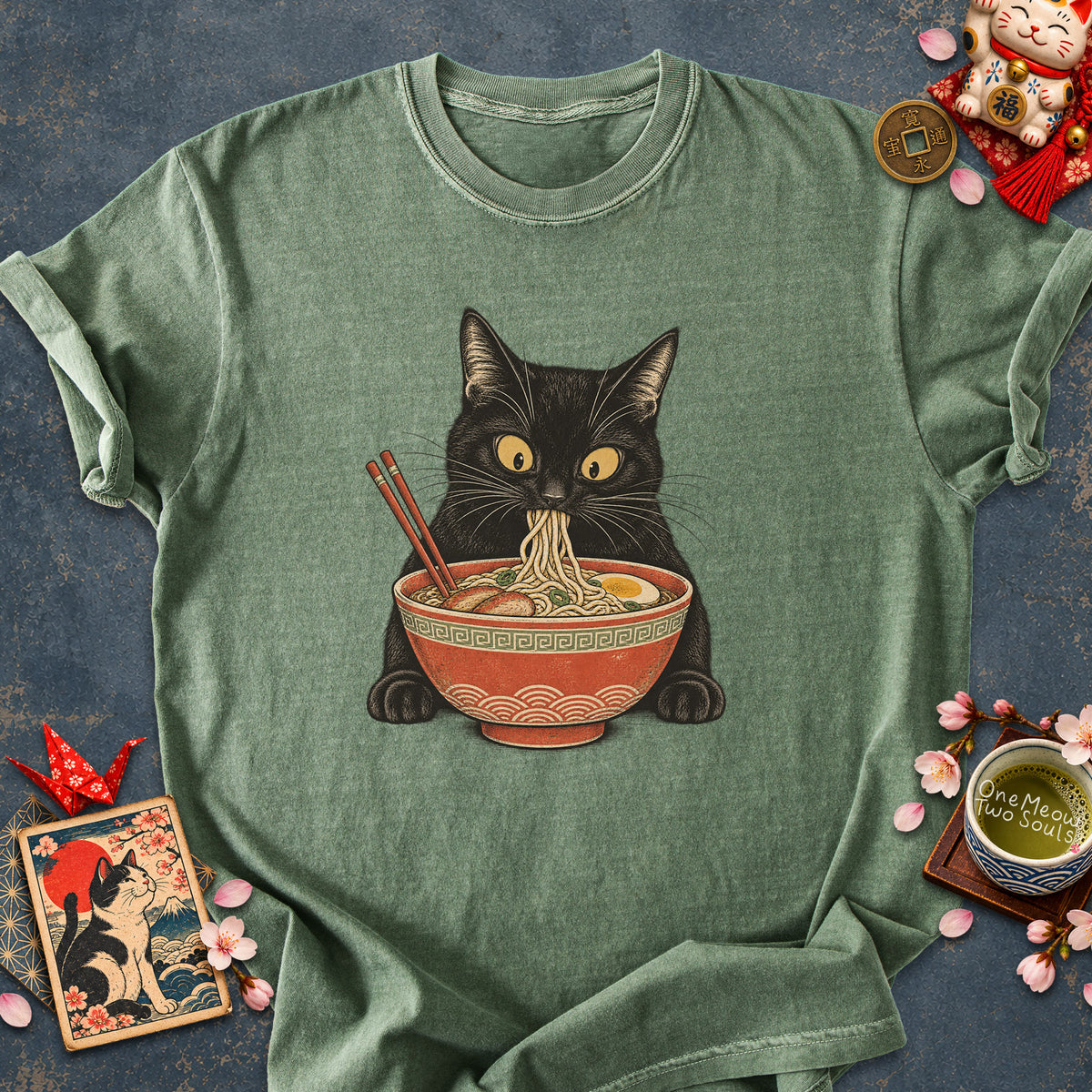 Moss colored Comfort Colors 1717 cotton T-shirt, featuring a Black cat eating Japanese ramen noodles. Funny cat design illustration. One Meow Two Souls brand.