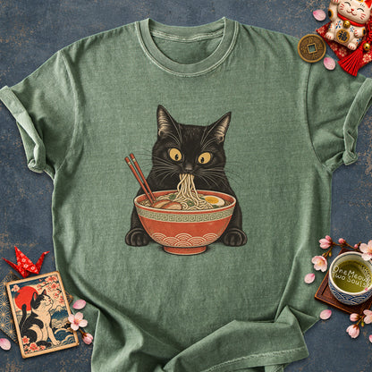 Moss colored Comfort Colors 1717 cotton T-shirt, featuring a Black cat eating Japanese ramen noodles. Funny cat design illustration. One Meow Two Souls brand.