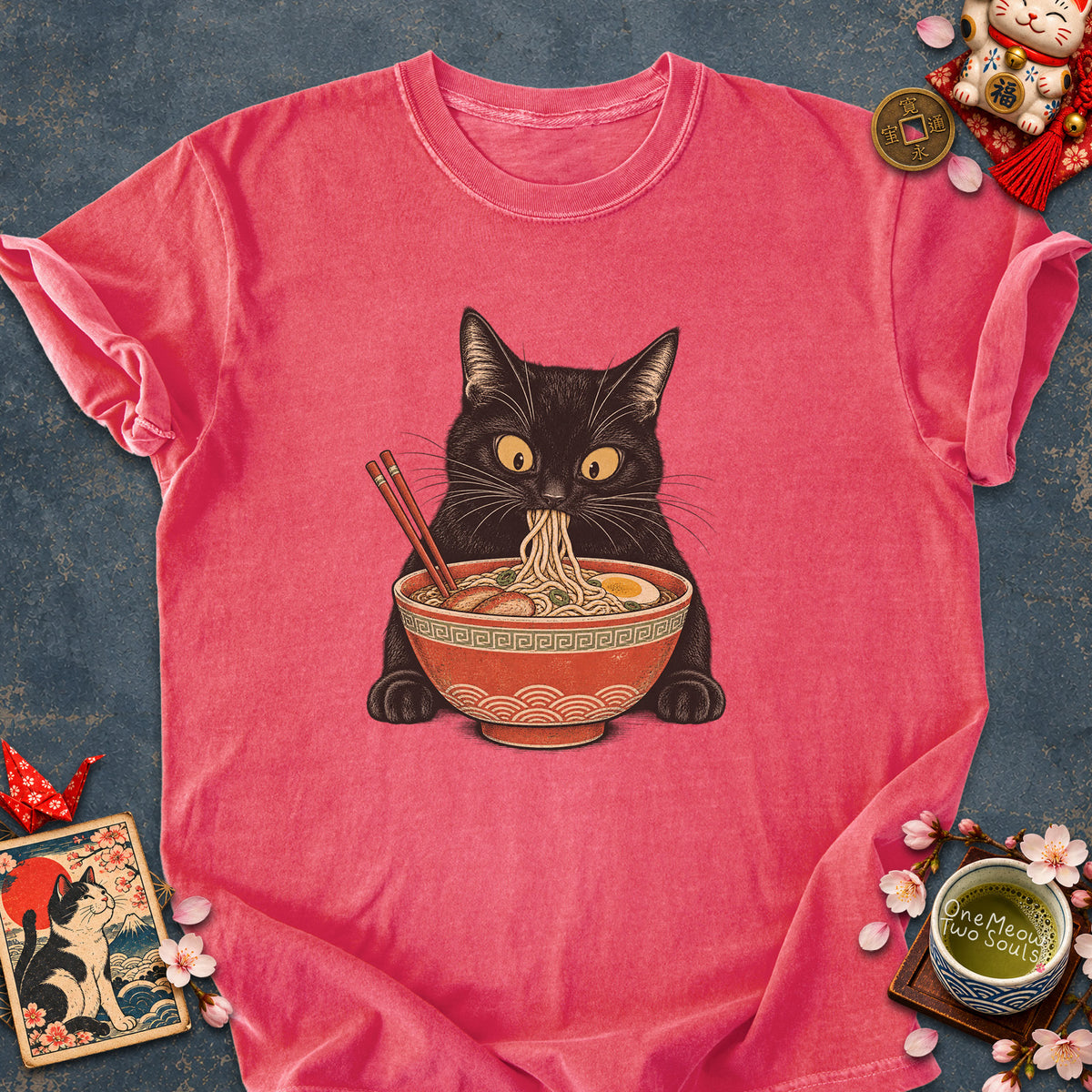 Watermelon colored Comfort Colors 1717 cotton T-shirt, featuring a Black cat eating Japanese ramen noodles. Funny cat design illustration. One Meow Two Souls brand.