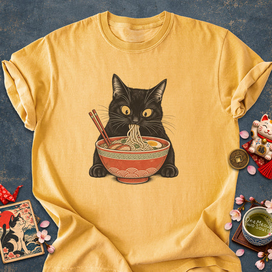Mustard colored Comfort Colors 1717 cotton T-shirt, featuring a Black cat eating Japanese ramen noodles. Funny cat design illustration. One Meow Two Souls brand.