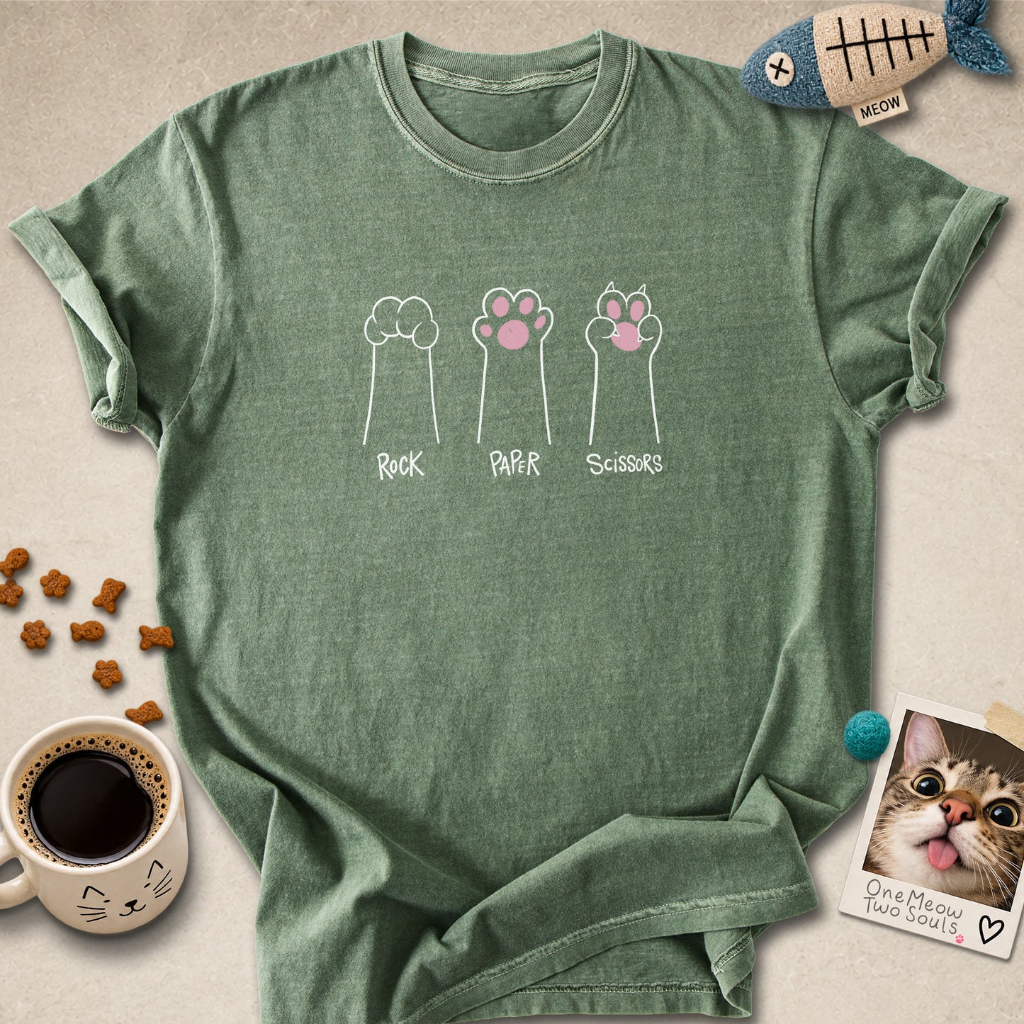 Moss colored Comfort Colors 1717 cotton T-shirt, presenting a "Rock Paper Scissors" funny cat design. One Meow Two Souls brand.