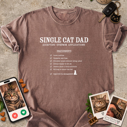 Espresso colored Comfort Colors 1717 cotton T-shirt, featuring a "Single cat dad accepting stepmom applications" funny cat design illustration. One Meow Two Souls brand.