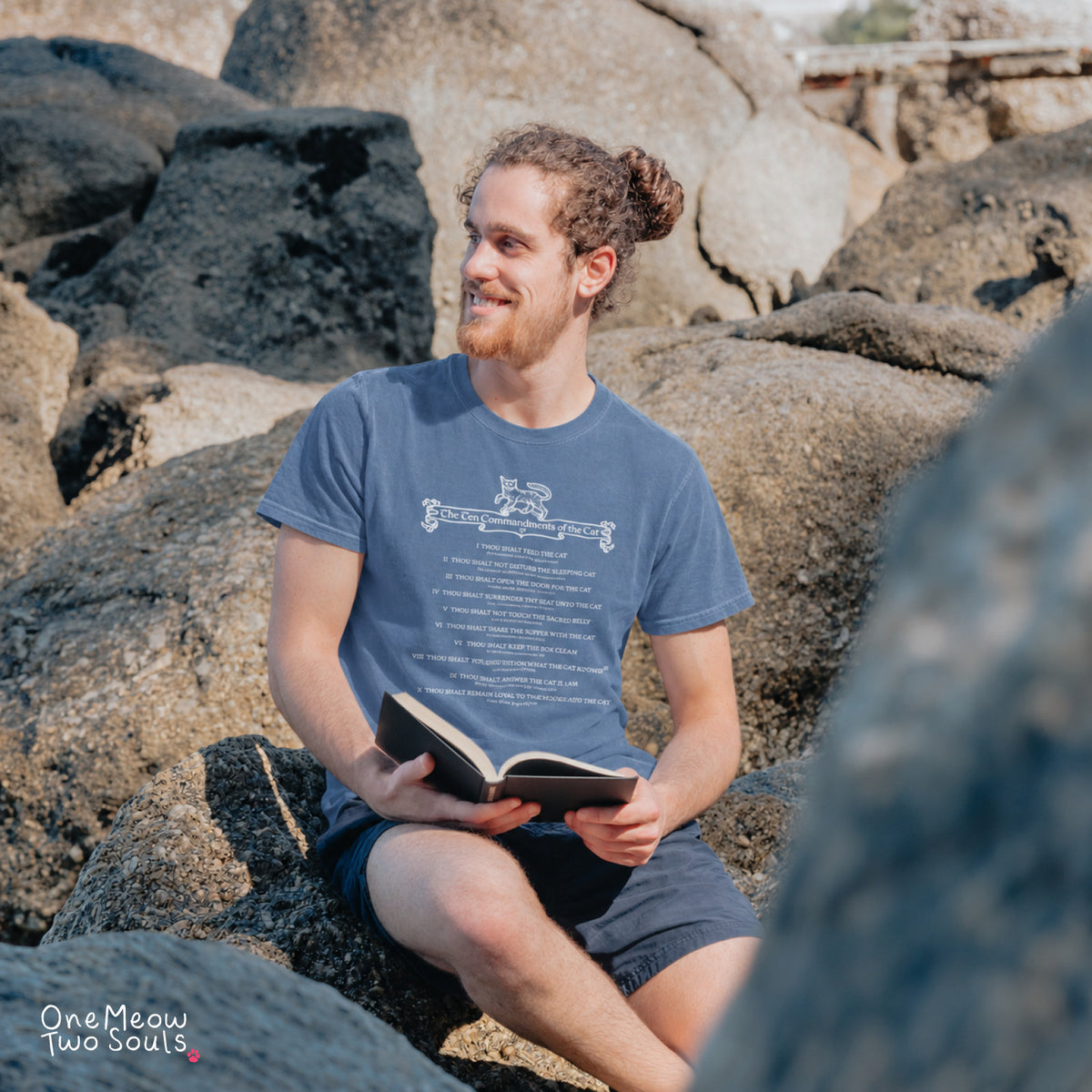 Blue jean colored Comfort Colors 1717 cotton T-shirt, featuring a "The Ten Commandments of the Cat" funny cat design illustration. One Meow Two Souls brand.