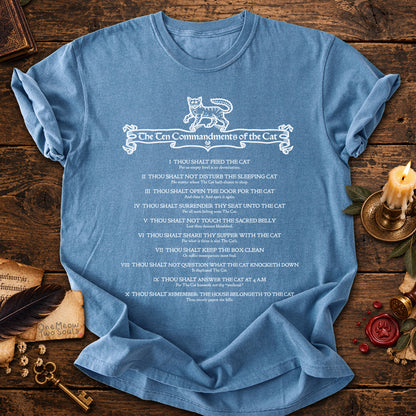 Blue Jean colored Comfort Colors 1717 cotton T-shirt, featuring a "The Ten Commandments of the Cat" funny cat design illustration. One Meow Two Souls brand.