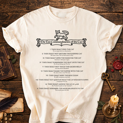 Ivory colored Comfort Colors 1717 cotton T-shirt, featuring a "The Ten Commandments of the Cat" funny cat design illustration. One Meow Two Souls brand.