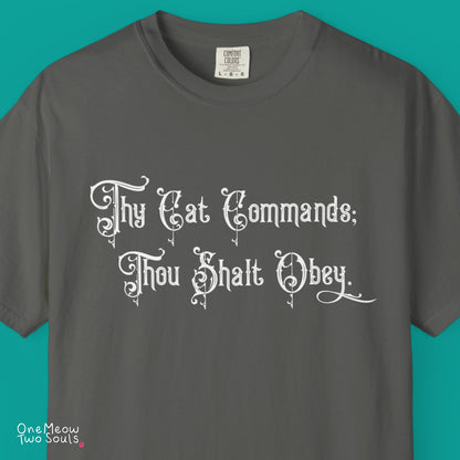 Pepper colored Comfort Colors 1717 cotton T-shirt, featuring a "Thy Cat Commands. Thou Shalt Obey" funny cat design illustration. One Meow Two Souls brand.