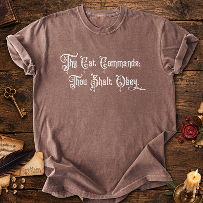 Espresso colored Comfort Colors 1717 cotton T-shirt, featuring a "Thy Cat Commands. Thou Shalt Obey" funny cat design illustration. One Meow Two Souls brand.