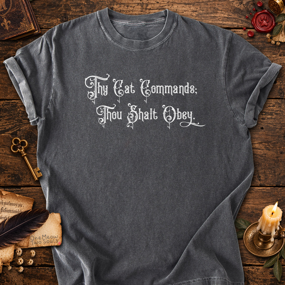 Pepper colored Comfort Colors 1717 cotton T-shirt, featuring a "Thy Cat Commands. Thou Shalt Obey" funny cat design illustration. One Meow Two Souls brand.