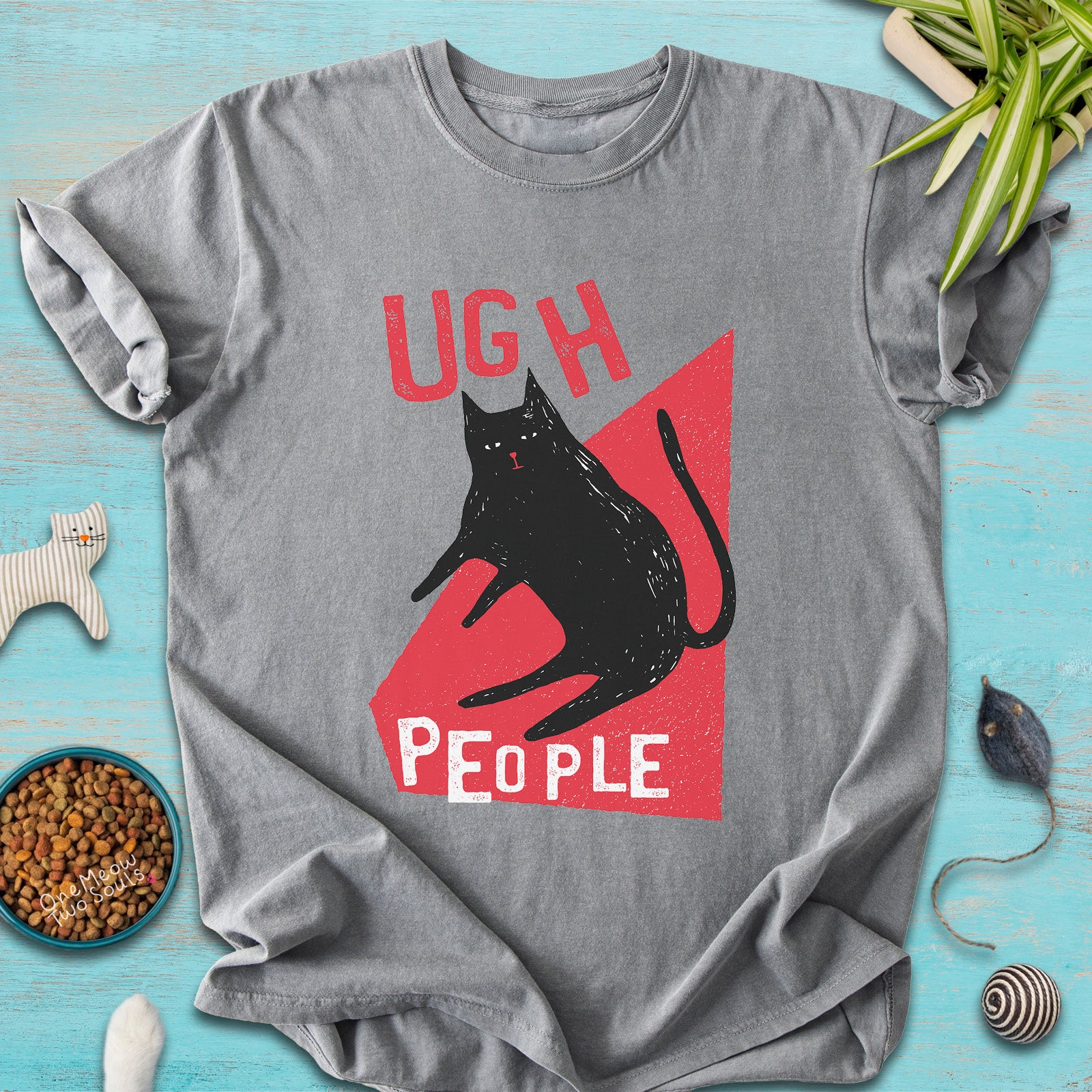 Grey colored Comfort Colors 1717 cotton T-shirt, presenting a "Ugh People" funny cat design. One Meow Two Souls brand.