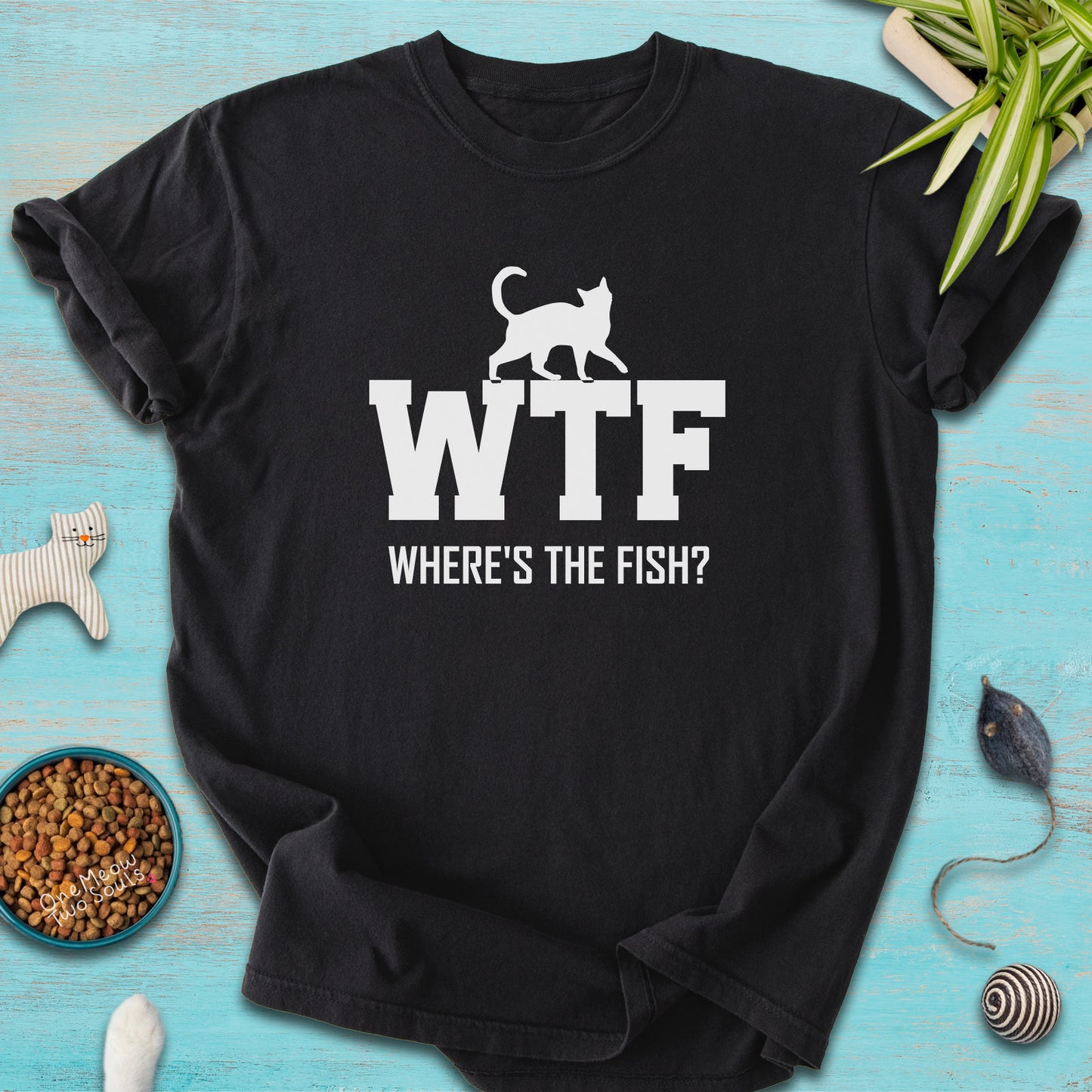 Black colored Comfort Colors 1717 t-shirt presenting a "WTF Where's The Fish?" funny cat design. One Meow Twou Sould brand.