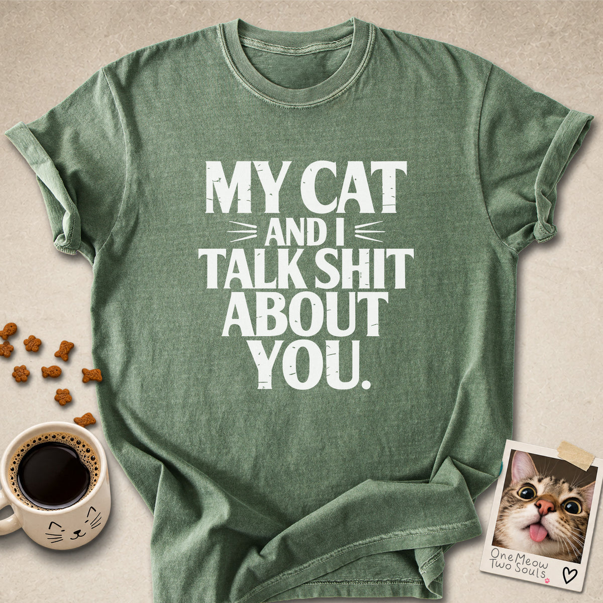 Moss colored Comfort Colors 1717 cotton T-shirt, featuring a "My cat and I talk shit about you" funny cat design illustration. One Meow Two Souls brand.
