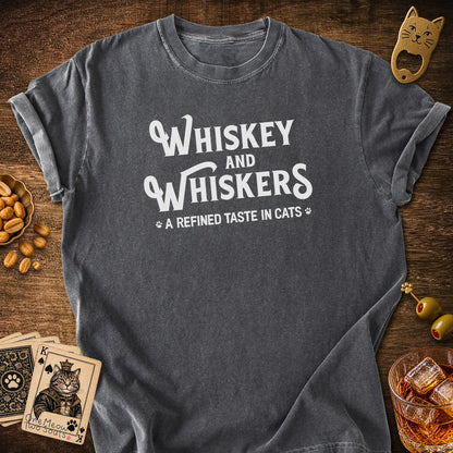 Pepper colored Comfort Colors 1717 cotton T-shirt, with a "Whiskey and Whiskers" design. One Meow Two Souls brand.